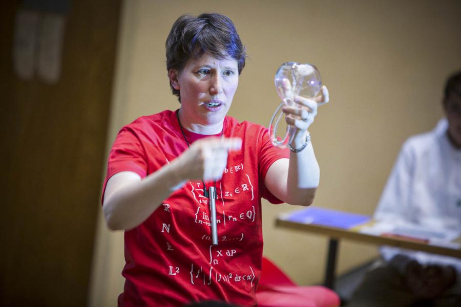 Professor Tara Holm delivers the keynote talk on topology at the 2016 Family Mathmatics Program.