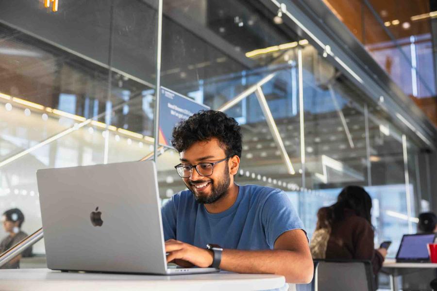 person sitting at computer