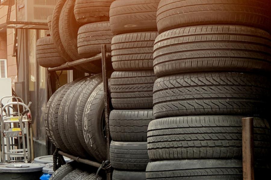 Tall stacks of old car tires