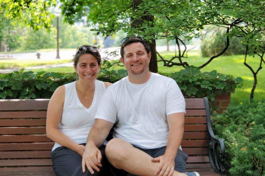 two people on a park bench