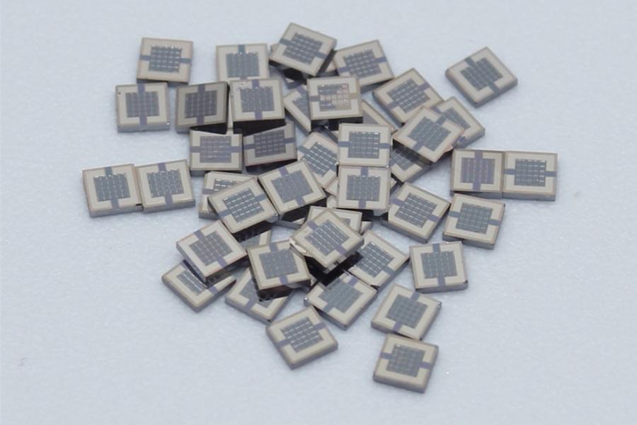 Pile of tiny squares: SPECS devices