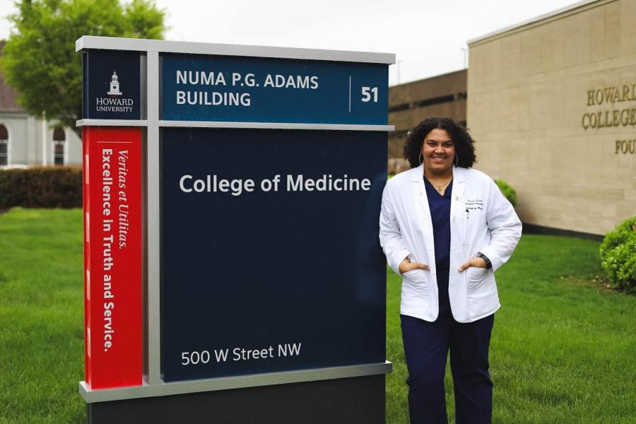 person outside medical school building