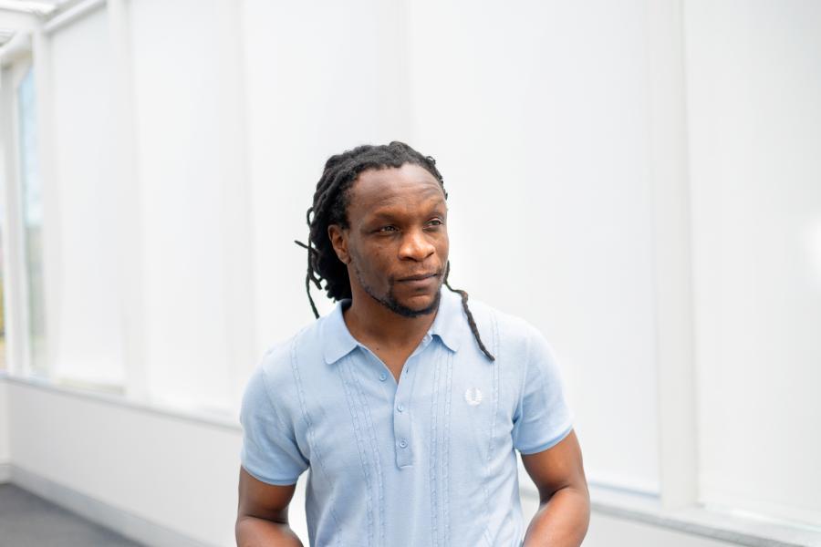 Ishion Hutchinson Ishion Hutchinson in front of a white wall