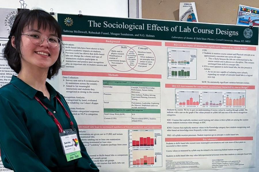 person with research poster