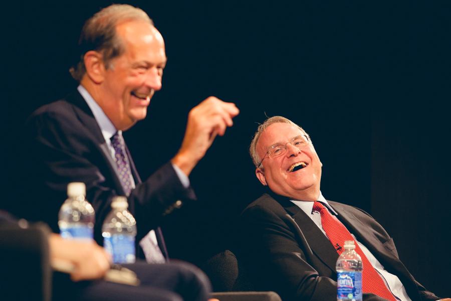 Two people laughing together