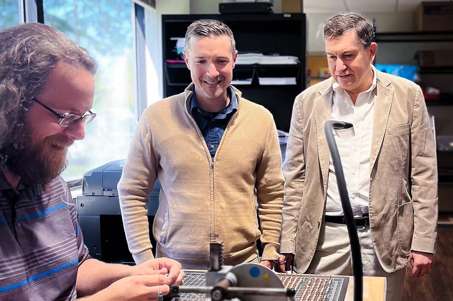 people watching someone do work