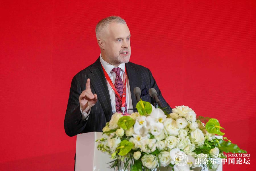 man speaking at a podium