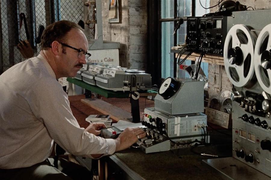 person working on a film projector