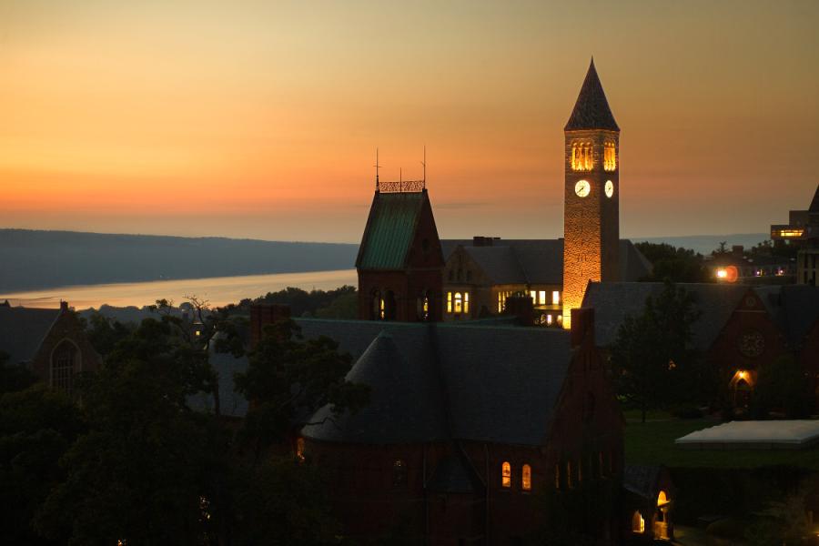 College campus buildings with lights on at dusk