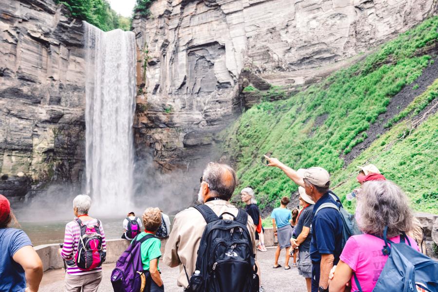 People observing a waterfall 