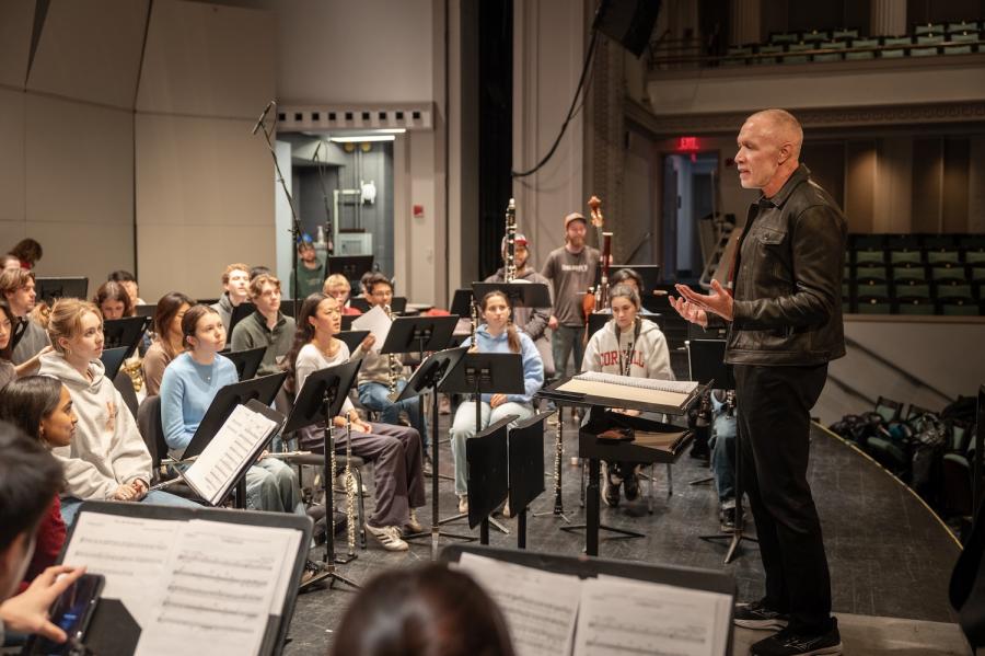 Michael Abels conducting student musicians