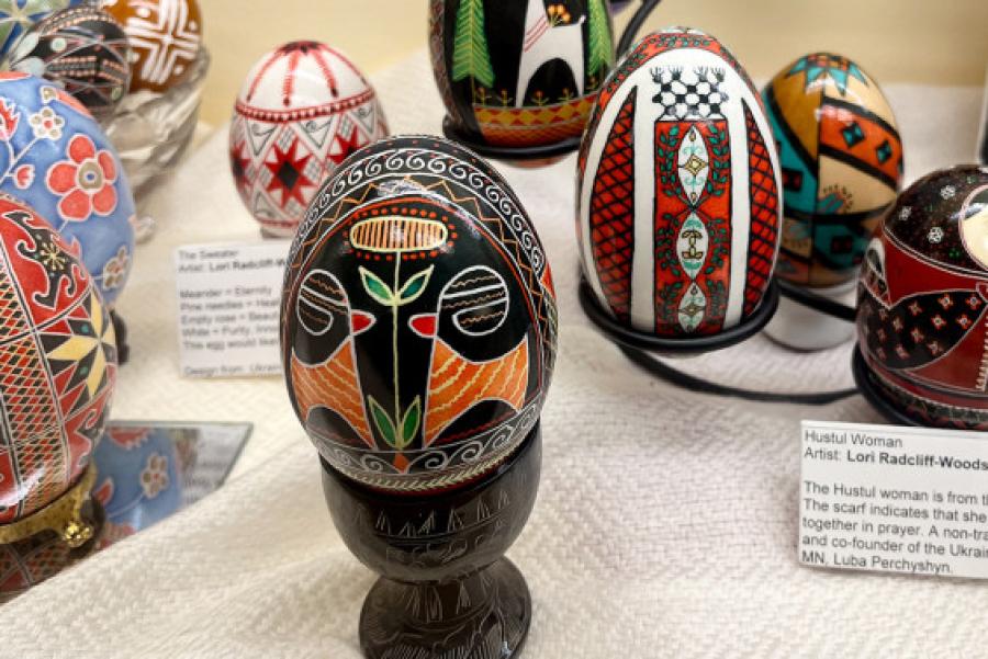 Close up view of several intricately colored Easter eggs in a display