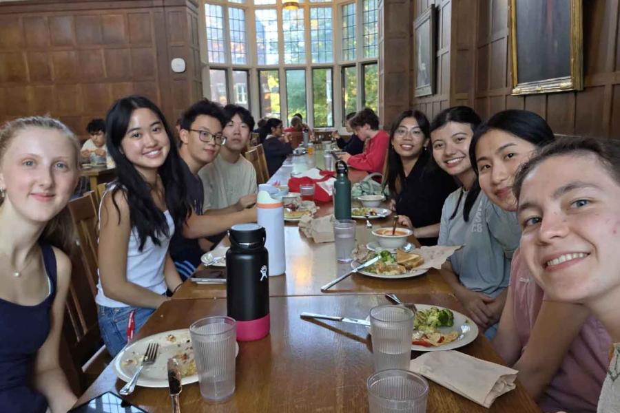 people sitting at a dining table