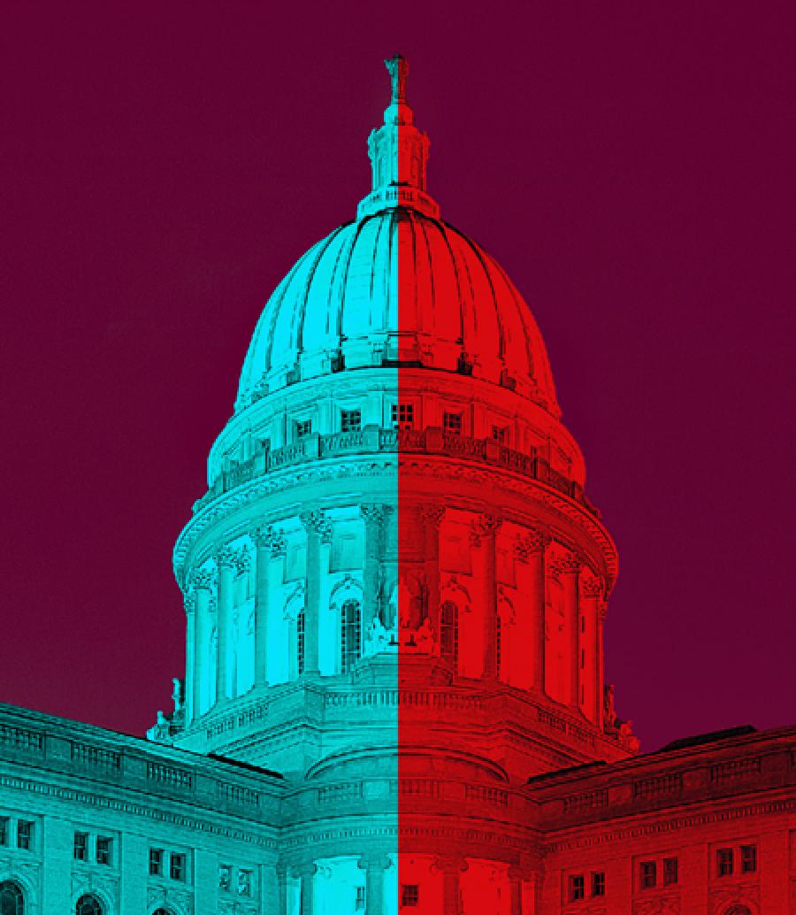  The top of the U.S. Capitol building, half in blue and half in red
