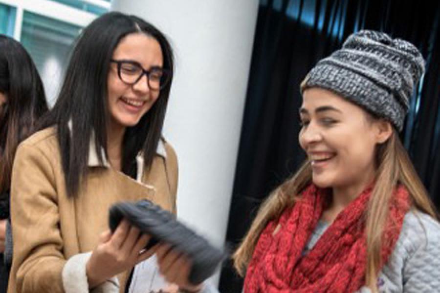 Warm hats being shared with new Puerto Rican students