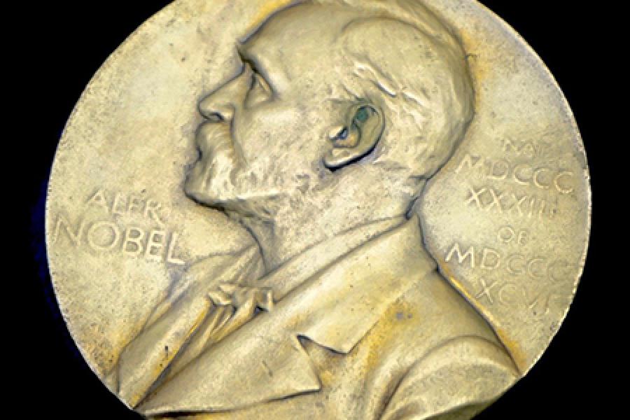 The Nobel Prize as a Gold medal on black background