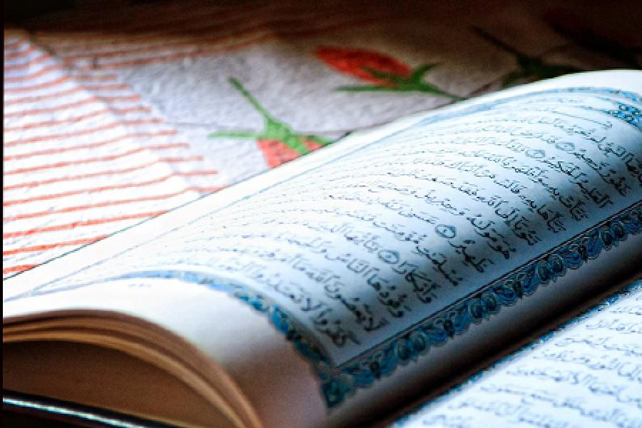  Open book with Arabic writing