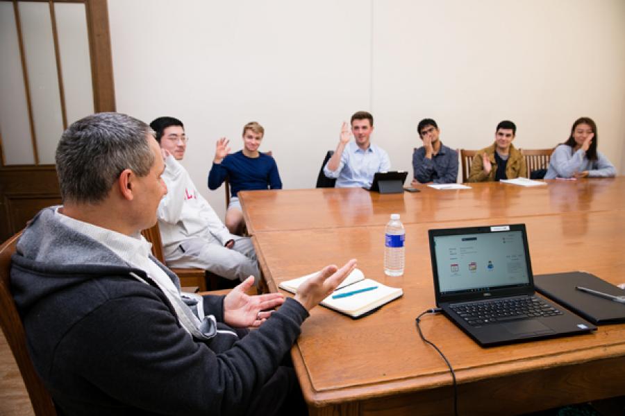 Cristos Goodrow '91 talks with students during a Career Conversation.