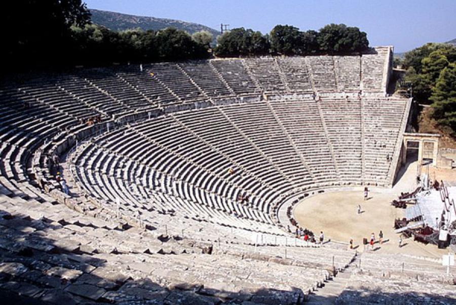 Rows of seats still standing in the ruin of the ancient theatre of Epidaurus