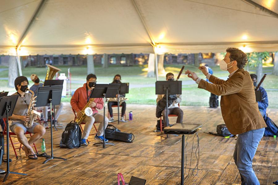 Musicians playing in a tent 