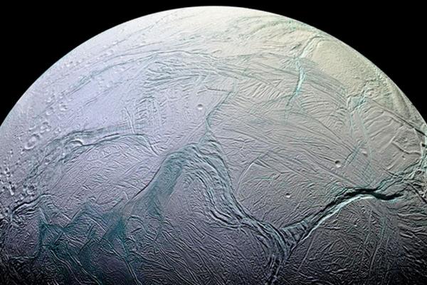 The frozen ocean world of Enceladus, a moon of Saturn.