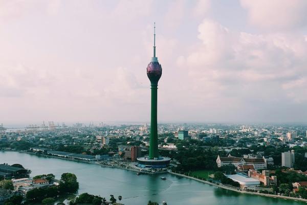 A city at midday with a tower 