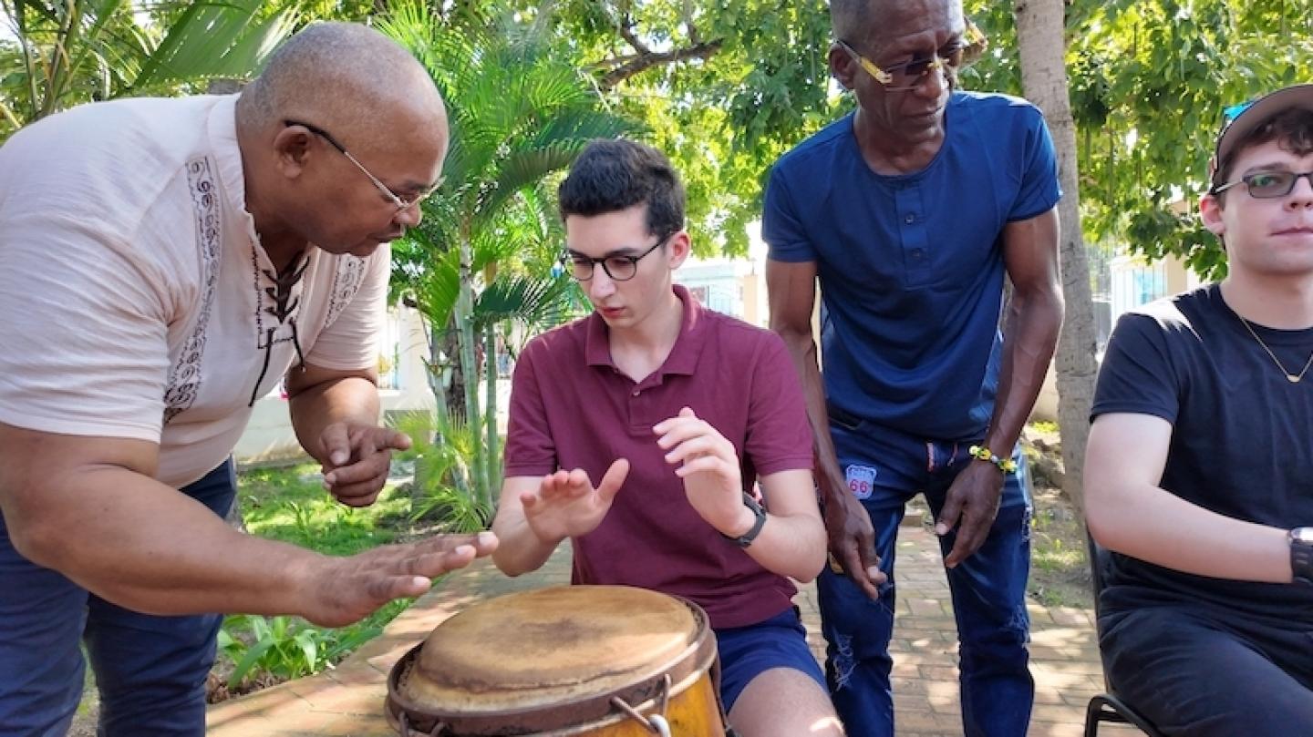 Cornell student plays the drums with Cuban musicians