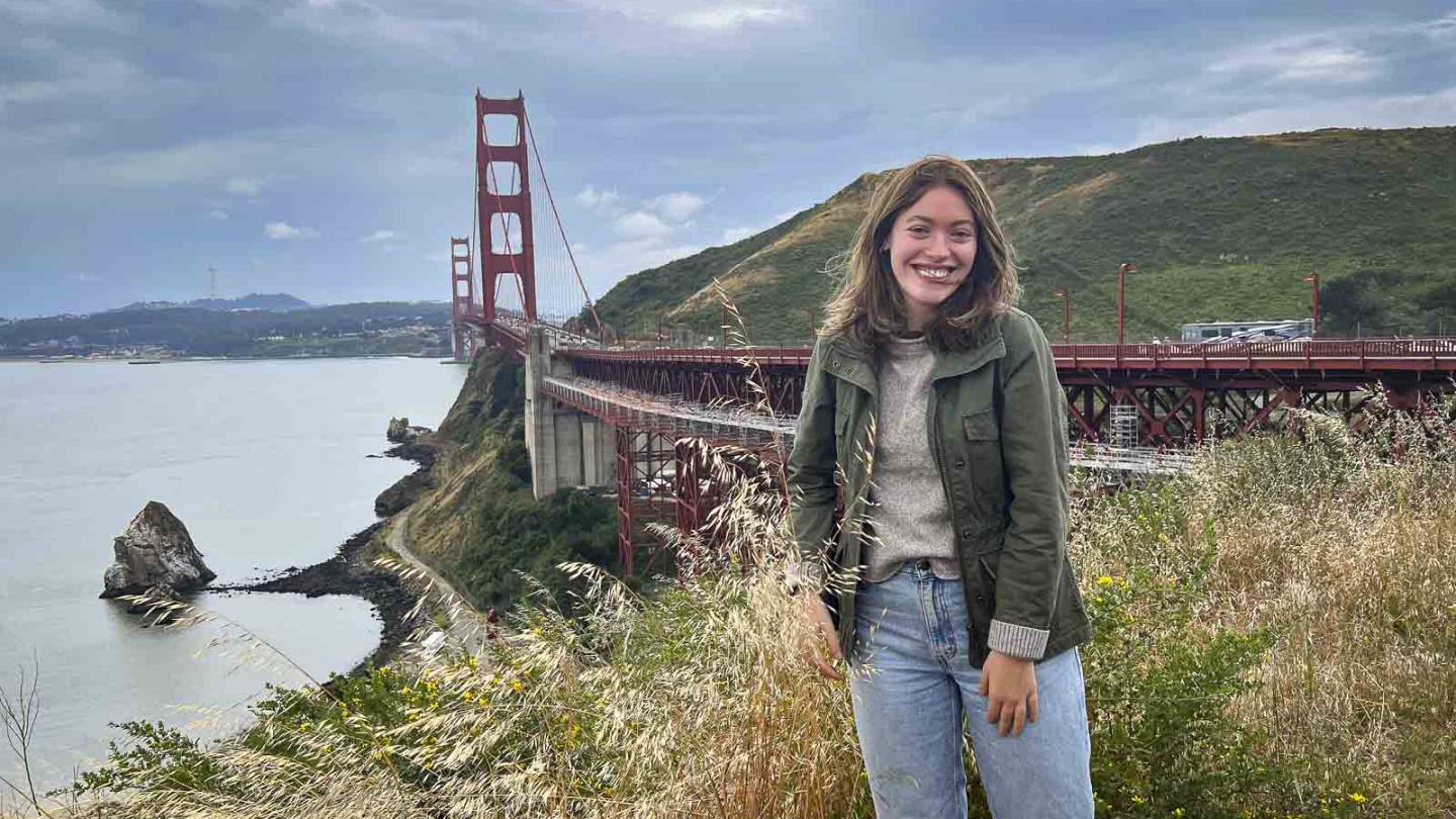 person near Golden Gate Bridge
