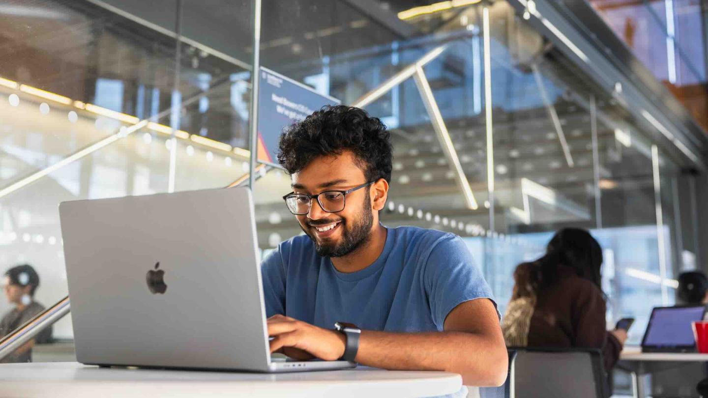 person sitting at computer