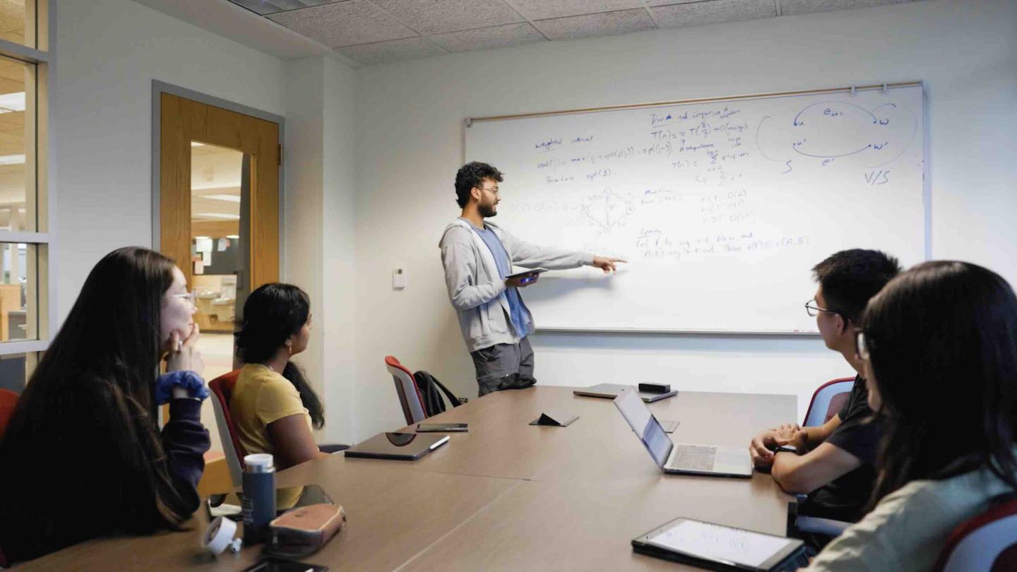 person teaching a class