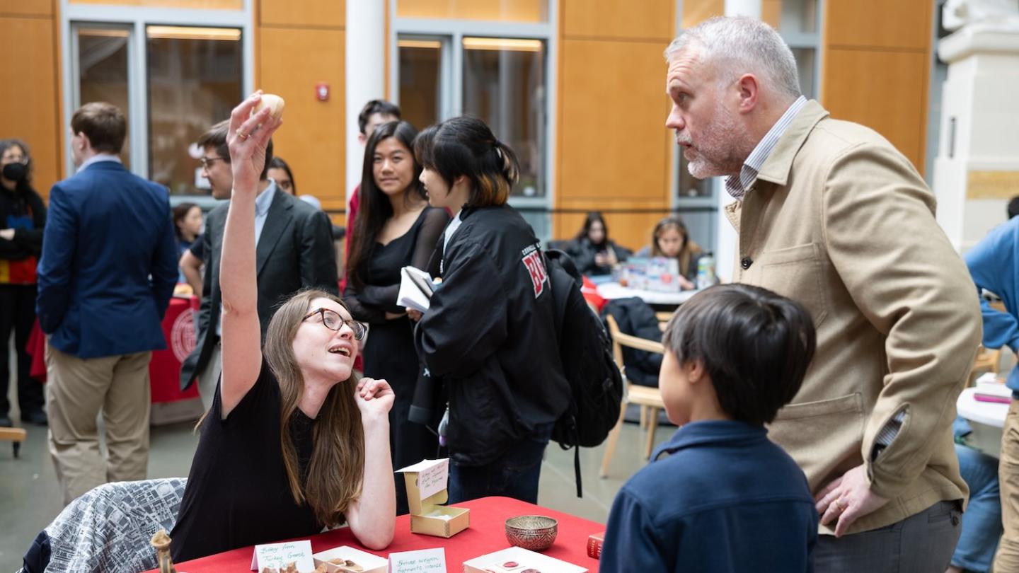 Dean Loewen listening to presentation at the Iliad